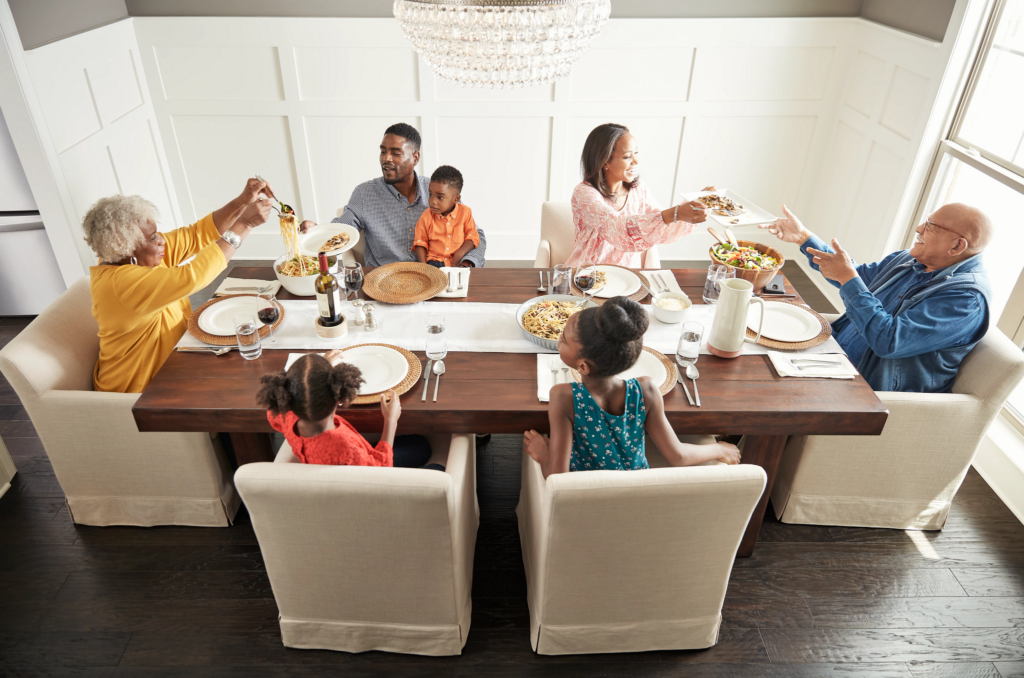 Family having breakfast at the dining table | LA Carpet Warehouse, Inc